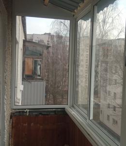 Раздвижные алюминиевые окна на балкон