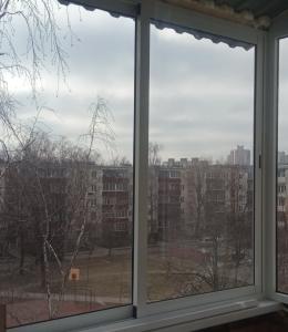 Раздвижные алюминиевые окна на балкон