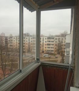 Раздвижные алюминиевые окна на балкон